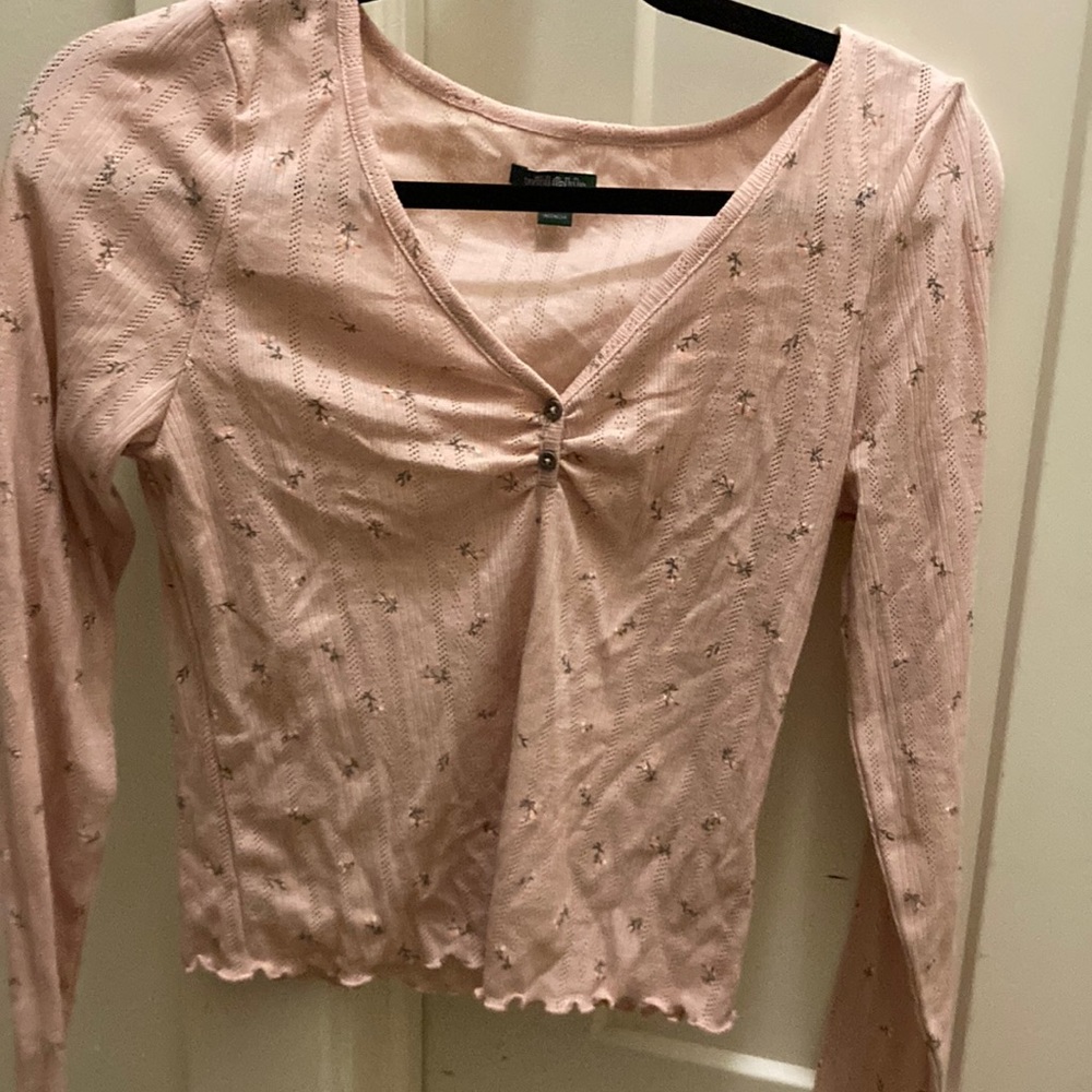light pink low cut long sleeve shirt